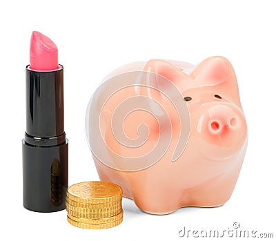 Lipstick with piggy bank and coins Stock Photo