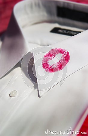 Lipstick on shirt collar Stock Photo