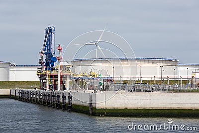 Liquid gas transshipment terminal in harbor Rotterdam, biggest seaport Europe Stock Photo
