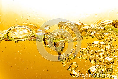 Liquid Gold Bubbles in Water or Oil Stock Photo