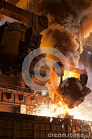 Liquid iron from the ladle Stock Photo