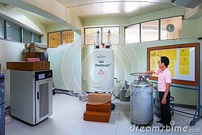 Liquid nitrogen refill for nuclear magnetic resonance spectrometer Editorial Stock Photo