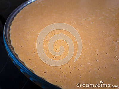 Liquid pumpkin dough for baking Stock Photo