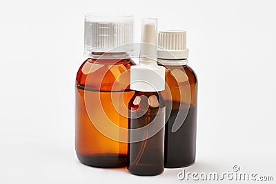 Liquid remedy in bottles. Stock Photo