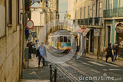 Traditional tram carriage in the city centre of Lisbon Editorial Stock Photo