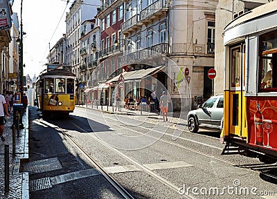 LISBON BAIRRO ALTO, PORTUGAL - AUG 04: Busy lifestyle in the old town of Lisbon with traditional tram , shops and urban life in Editorial Stock Photo