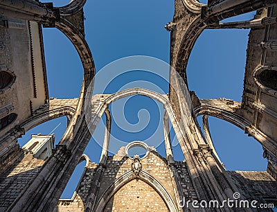 Ruined arches of the main nave of Carmo Church at Carmo Convent Convento do Carmo - Lisbon, Portugal Editorial Stock Photo