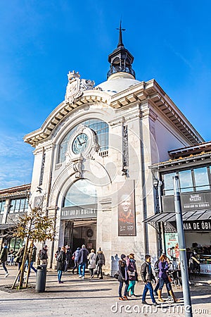 Time Out Market Lisboa, Portugal. External entrance, people walking on the street. Editorial Stock Photo