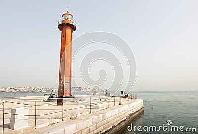 Lisbon, Portugal - 0510 2022 - Lighthouse on coast of Almada Editorial Stock Photo