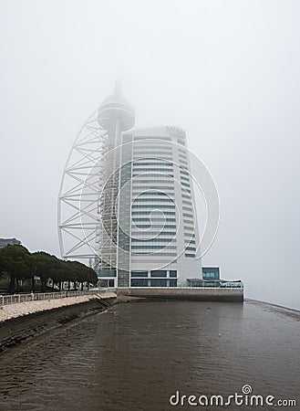 Lisbon, Portugal - The My Riad hotel at the shore of te Atlantic Ocean on a foggy day Editorial Stock Photo