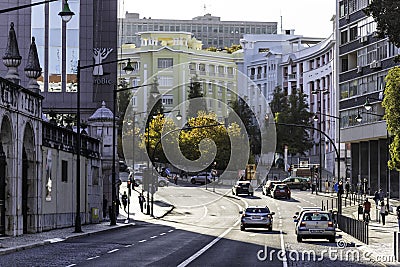 Lisbon, Portugal - 30 October 2020: The city center of Lisbon during a beautiful day. Cars stopped at the traffic lights, portugal Editorial Stock Photo