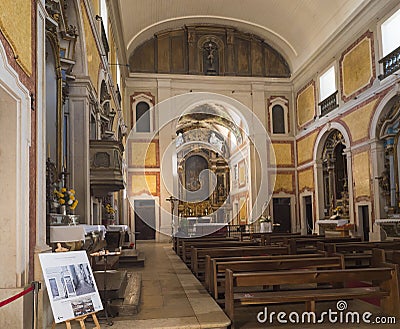 Lisbon, Portugal, October 24, 2021: Interior of Igreja de Santa Cruz do Castelo white baroque church at medieval quarter Editorial Stock Photo