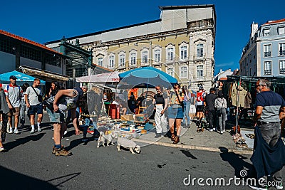 View of Lisbon`s iconic Ladra open flea market in the Alfama district Editorial Stock Photo