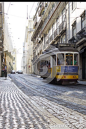 LISBON, PORTUGAL - SEPTEMBER 4, 2018: Famous Old trams on street of Lisbon.Vintage tram in Lisbon, Portugal in a summer Editorial Stock Photo