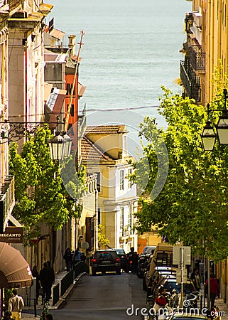 Lisbon, Portugal: Serpa Pinto street, downtown, with view to Tagus river Editorial Stock Photo