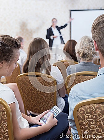 Listener during dull presentation Stock Photo