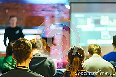 Listeners trained audience. Young people audience listen speaker during a lecture, training or presentation. Editorial Stock Photo