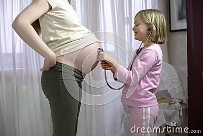 Listening to baby Stock Photo