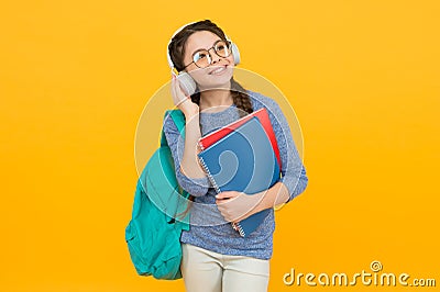 Listening to language youre learning. Happy child listen to music. Listening lesson. Online learning. English school Stock Photo