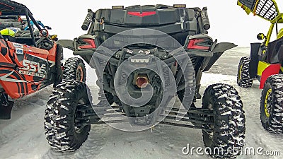 Listvyanka, Russia - February 29, 2020: Rear view of a buggy car standing in the snow. Editorial Stock Photo