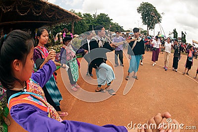 Lisu hill tribe traditional dancing in Thailand. Editorial Stock Photo