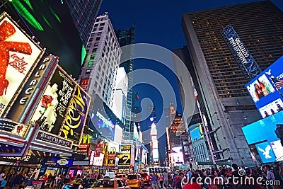 Lit up New York Time Square in the Evening with traffic congestion and human crowd Editorial Stock Photo