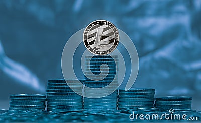 Litecoin coin against background of light and shade Stock Photo