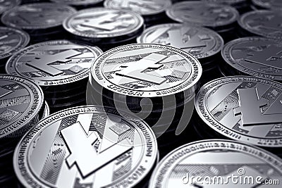 Litecoin coins LTC in blurry closeup. New cryptocurrency and modern banking concept. Stock Photo