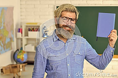 Literature and poetry. Back to school. Bearded man reading book. Inspiring to learn. Modern school. Private lesson Stock Photo