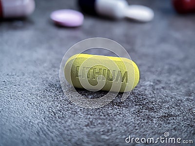 Lithium medication yellow pill Stock Photo