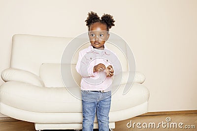 Litle cute sweet african-american girl playing happy with toys at home, lifestyle children concept Stock Photo