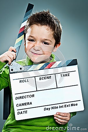 Little Actor with a Slate in His Head Stock Photo