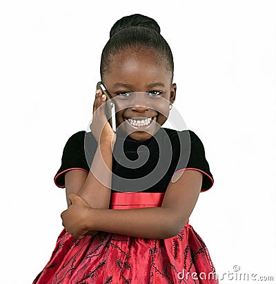 Little african american girl talking to the phone Stock Photo