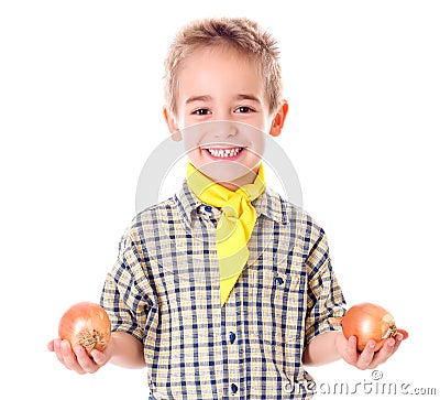 Little agriculturist holding onions Stock Photo