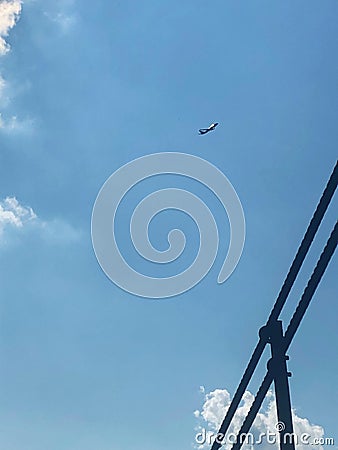 little airplane in the beautiful blue sky Stock Photo