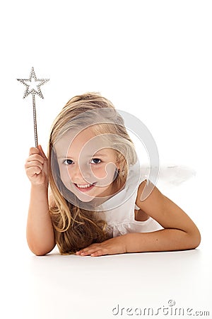 Little angel fairy with magic wand Stock Photo