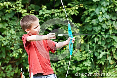 Little archer with bow and arrows Stock Photo