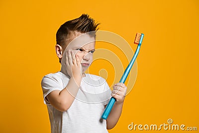 Little boy suffering from toothache - Dental problem. Stock Photo