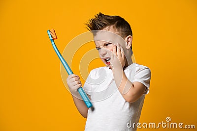 Little boy suffering from toothache - Dental problem. Stock Photo