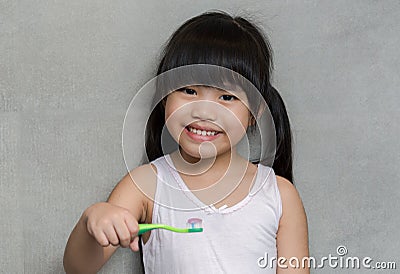 Little asian cute girl brush teeth Stock Photo