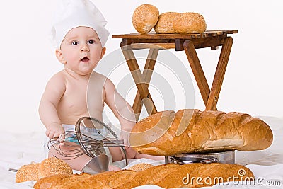 Little baby chef with bread over white Stock Photo