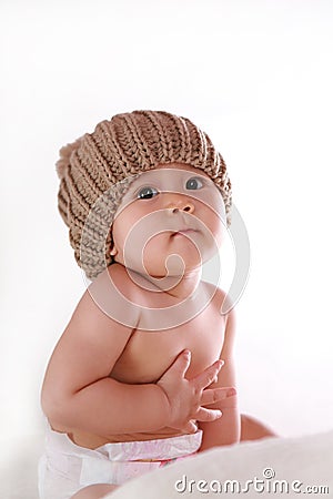 Little baby clutching his stomach Stock Photo