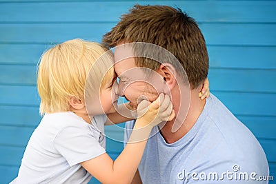 Little baby embrace his father Stock Photo