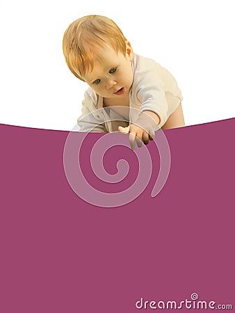 Little baby girl baby curiously bent over the colored sheet. Stock Photo