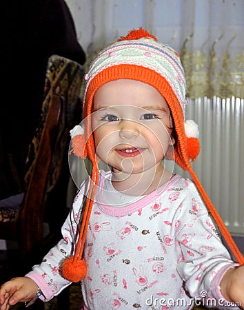 Little baby girl in knitted hat Stock Photo