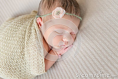 Little baby girl sleeping on belly, closeup Stock Photo
