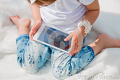 Little baby girl with Tablet Stock Photo