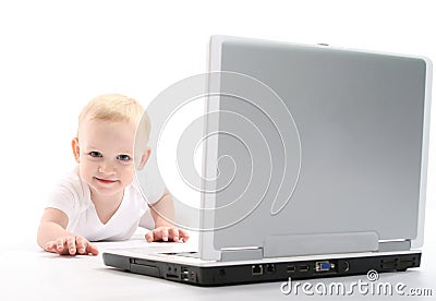 Little baby using laptop Stock Photo