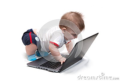 Little baby using laptop Stock Photo