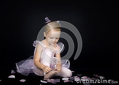 A Little Ballerina and slipper Stock Photo